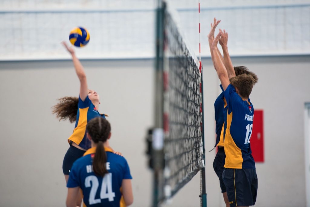 Students playing volleyball